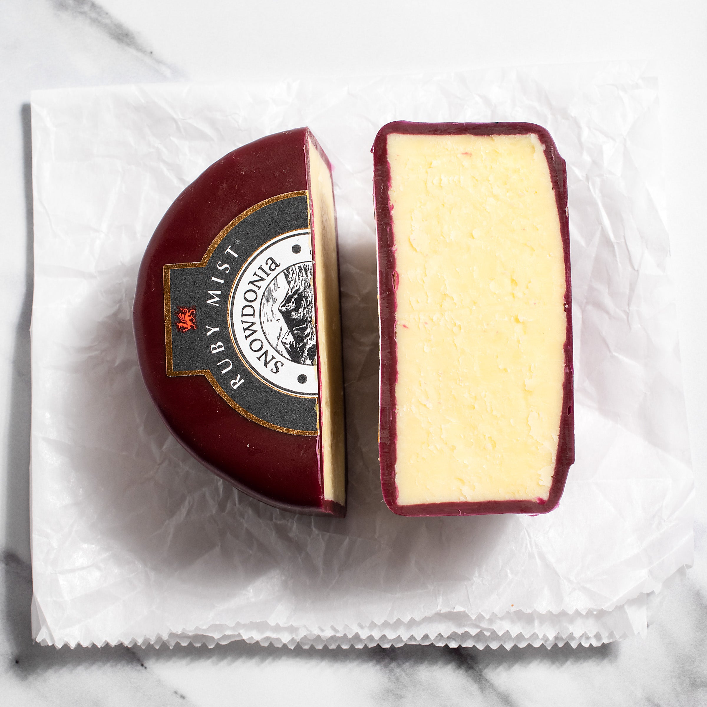 igourmet_2449-1_Ruby Mist Welsh Truckle Cheese - Mature Cheddar with Port and Brandy_Snowdonia_Cheese